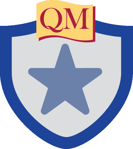 star inside shield with QM at top